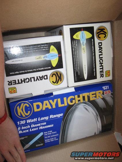 Box of KC Daylighter lights, 130 Watt Long Range, 6 Inch Diameter