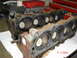 1995 Ford Bronco - Two engine cylinder heads are shown, likely removed for repair or replacement.