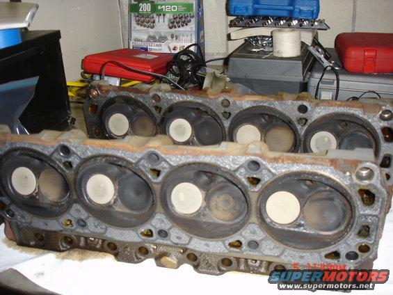 Engine cylinder heads with valves visible