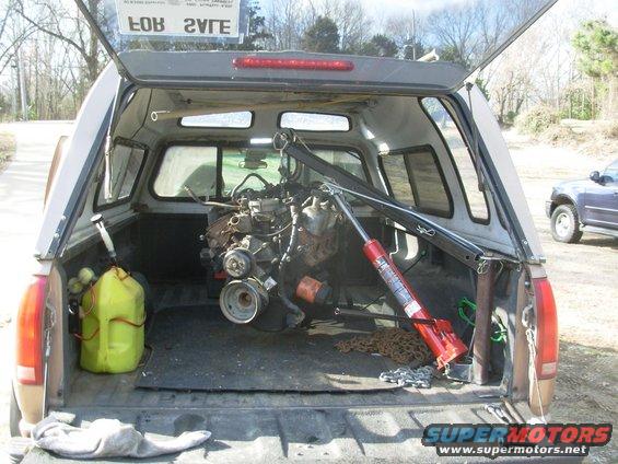 54engine.jpg With the shorter boom, it swings inside.  I put one strap on the engine to keep it from swinging, and drove home.

I still have to dismantle the crane for sandblasting, finish welding, & painting.

If I ever install a 5th-wheel hitch, this will make it easy to set & remove.