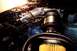 2012 Ford Mustang - The SVT supercharged engine of a 2012 Ford Mustang Boss 302 is shown in detail.