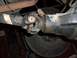 1989 Ford Bronco - Close-up of a vehicle's rear axle and driveshaft components.