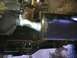 1996 Ford Bronco - Custom exhaust pipe and muffler installation visible from underneath a vehicle.