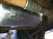 1996 Ford Bronco - Close-up of a Magnaflow exhaust muffler, showing the brand name stamped into the metal.