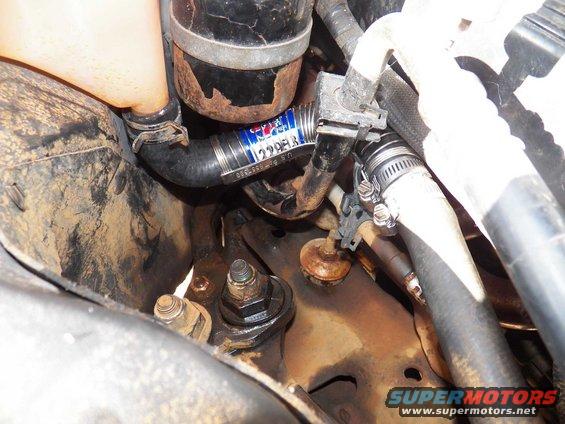 Using a unicoil on a hose to get around the a/c line.