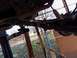 1989 Ford Bronco - Underside view of a vehicle's rear axle assembly, showing suspension components.