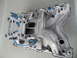 1973 Ford Ranchero - Edelbrock Performer 400 intake manifold shown with blue vacuum fittings and a blue wire attached.