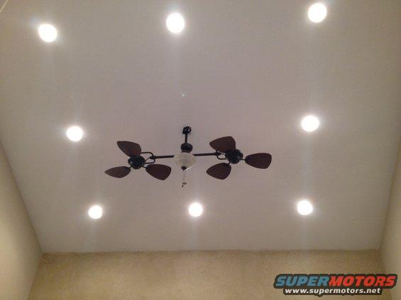 Ceiling fan with dark blades and recessed lighting