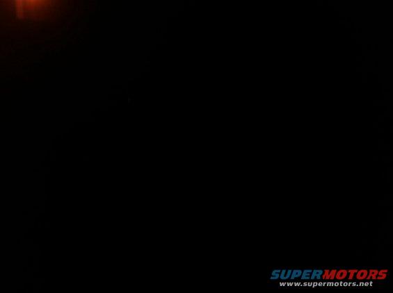 Supermotors.net logo and website address on a black background