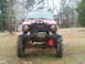 1978 Ford Bronco - This heavily modified Jeep Cherokee XJ sits on massive tires, ready for off-road adventures.