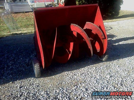 Red snowblower auger and wheels