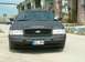 2003 Ford Crown Victoria - Matte black 2003 Ford Crown Victoria, likely a police interceptor, is shown from the front with "SHERIFF" text on the hood.