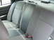 2003 Ford Crown Victoria - Interior view of a vehicle's rear seat, showing fabric upholstery and seat belts.
