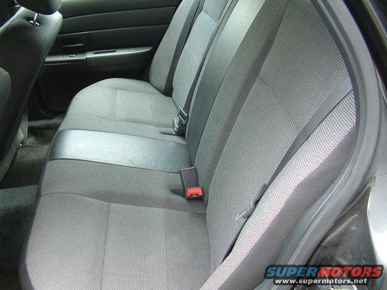 Gray fabric rear seats with black trim and seatbelts