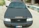 2003 Ford Crown Victoria - This black 2003 Ford Crown Victoria, marked as "SHERIFF", is shown from the front.