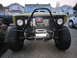 1974 Ford Bronco - This heavily modified SUV features oversized tires and a prominent winch mounted on the front bumper. The license plate is ACZ2139.