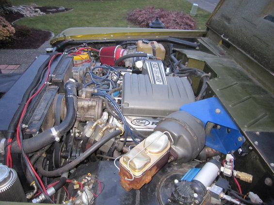 Ford 5.0 HO engine with red air filter and Ford Racing valve covers
