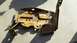 1978 Ford Bronco - This heavily rusted metal bracket appears to be a component from the engine bay of a 1978 Ford Bronco.