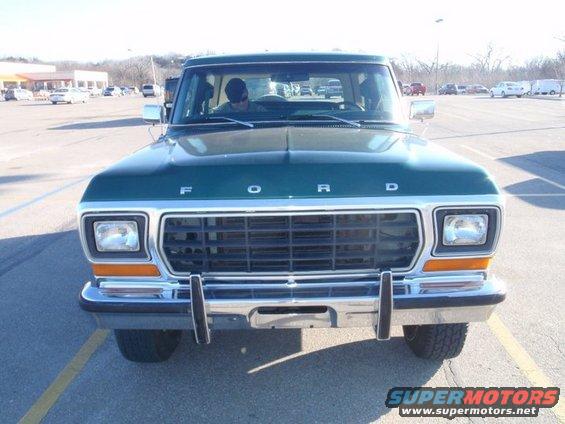 Green 1978 Ford Bronco front view. Ford lettering on hood