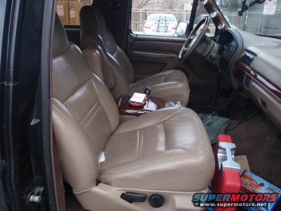 Interior view of tan leather seats and dashboard of a 1994 Ford Bronco