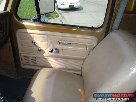 Tan interior door panel and seat of a 1978 Ford Bronco