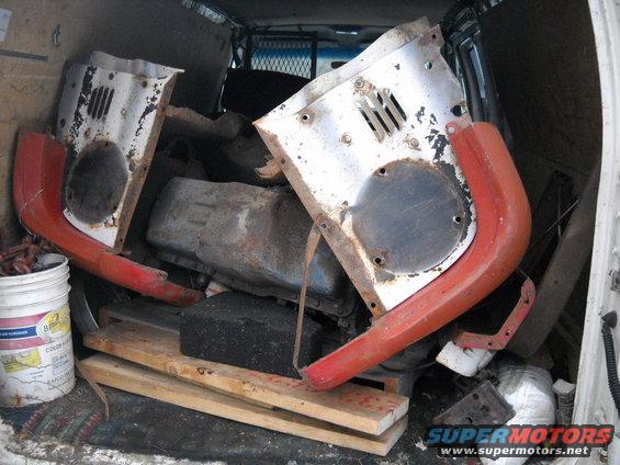 54-build--1142012-011.jpg 1-14-2012:  

Well a today I went on a little trip to pick up some more parts.  

I found a guy that had an almost rust free South Dakota 55 F500 front clip ( No hood and he wanted to keep the grille ) . The fenders are in really nice shape. They each have a small crack by where the running boards mount and the one has a small dent in an area that's going to be simple to fix. It was a 300 mile round trip to get the front clip. But I got the front clip for $100!:-jammin That's less then what a single fender was selling for. :D

I figure I can sell the rest of the front clip parts, since I don't need them. I should be able to get a little more then I paid for the front clip out of the rest of the parts.:D Which means free fenders!!:D


I've also been looking for a 240 inline 6 for a while.  I found a complete 69 240 and it was on the way to where I had to go for the front clip.:D   


Well here's my van full of used parts.:D