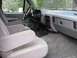 1988 Ford Bronco - The interior of a 1987 Ford Bronco shows its cloth seats and dashboard.