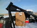 1973 Harley-Davidson Ultra - Roll cage and box loaded in a pickup truck bed during winter.