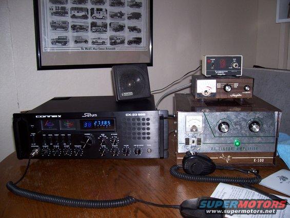 CB radio and RF linear amplifier on a wooden desk