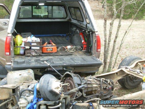 74transin.jpg I pulled the t-case by hand, but I don't think my back can take any more E4ODs, so I'm using the bed crane again.