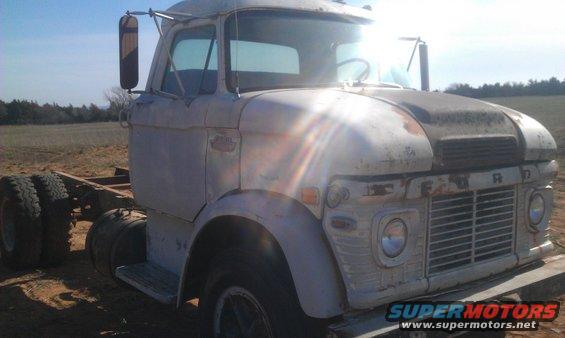 1973 Ford F-100 cab and chassis parked in a field