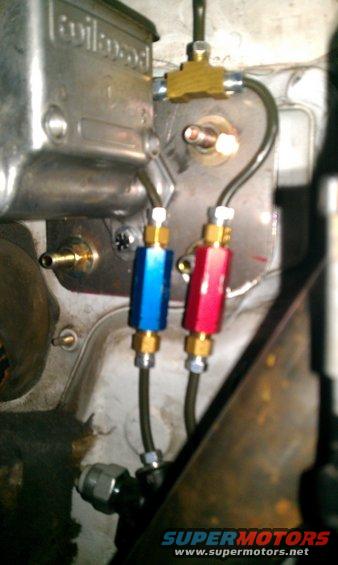 Wilwood brake master cylinder with blue and red inline filters and brass fittings