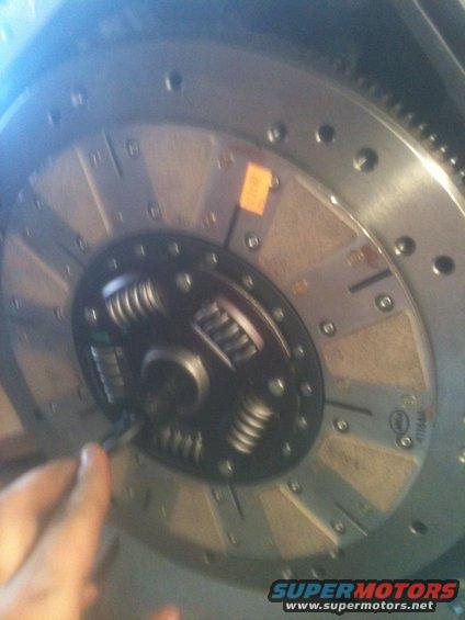 close-up of a car's clutch disc with springs and friction material