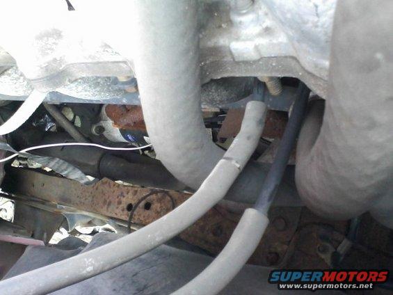 Engine bay hoses and rusty frame