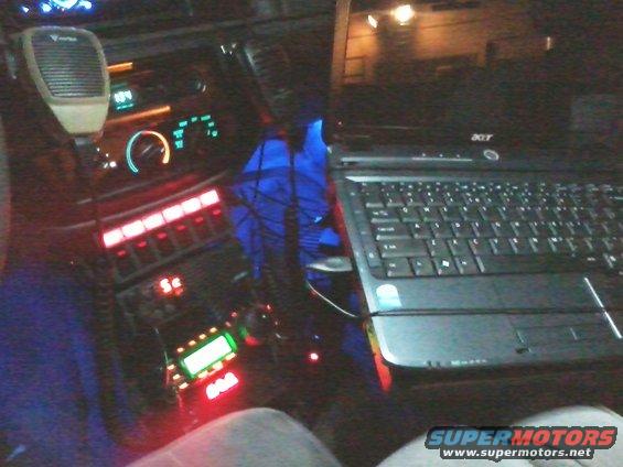 Night view of Control box, radio and laptop