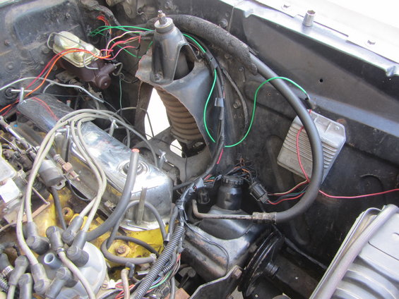 Engine bay with chrome valve covers and wiring