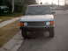 1991 Land Rover Range Rover - This SUV, likely from the late 1980s, is parked on a residential street.