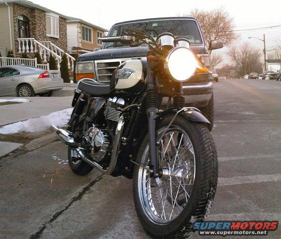 Black and cream motorcycle front view