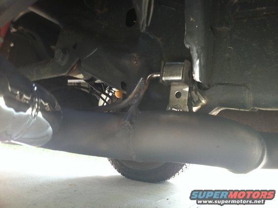 Underside view of exhaust pipe and suspension parts