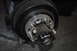 1974 Ford Bronco - This image shows a close-up of a vehicle's hub assembly, including the brake drum and wheel studs.