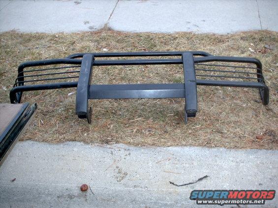 Black bull bar with horizontal slats and vertical supports