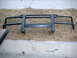 1991 Land Rover Range Rover - A black bull bar, likely for an off-road vehicle, is displayed on the ground.