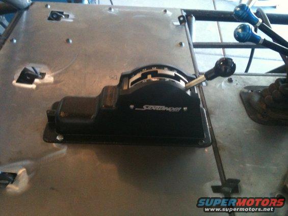 Black throttle control with 'SideWinder' text