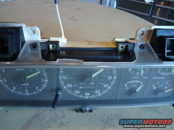 Instrument cluster with tachometer, speedometer, fuel, and oil gauges