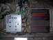 1991 Land Rover Range Rover - Close-up view of car audio equipment, including a Sunkyong amplifier and an Acoustic crossover, with visible wiring.