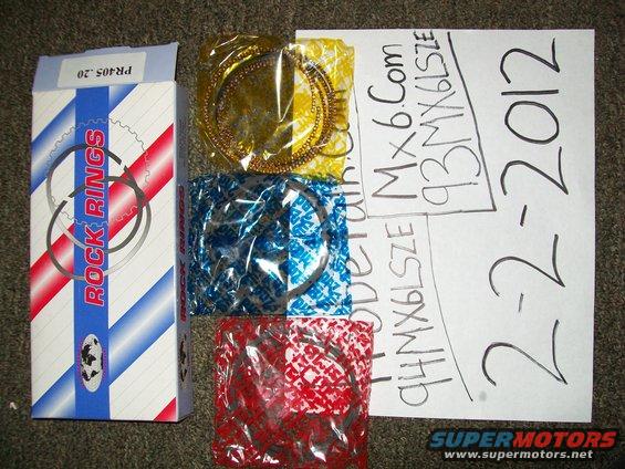 Rock Rings box and three packages of piston rings, with handwritten notes including '94 MX6LSZE' and '2-2-2012'