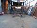 1987 Ford Ranger - A vehicle's front axle assembly is disassembled and supported by jack stands.