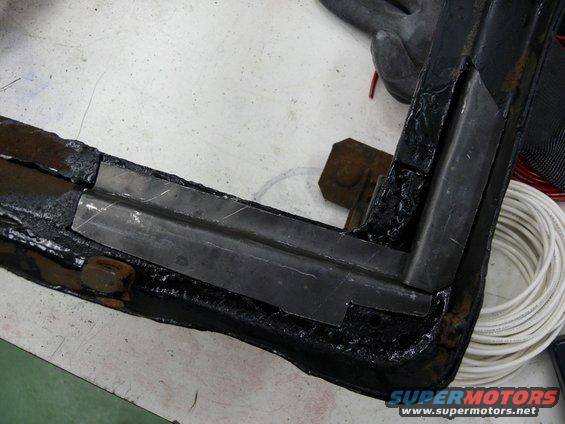Reinforced car frame corner with metal plates and black coating