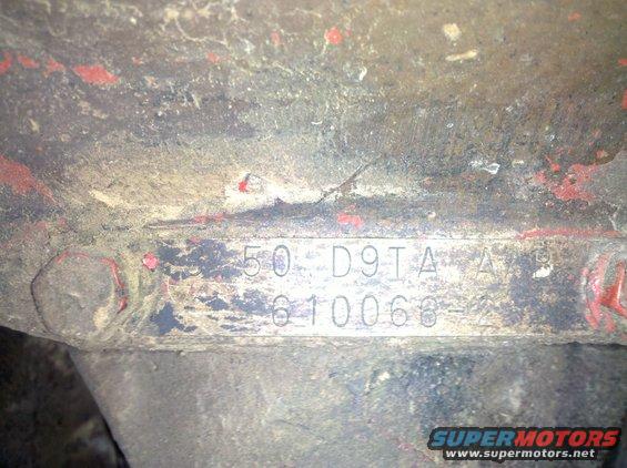Stamped metal plate with numbers 50 D9TA A B and 610068