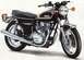 1976 Yamaha XS650 - A black 1976 Yamaha XS650 motorcycle is shown from a three-quarter front view against a white background.